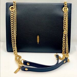 Thacker Black Leather Handbag with Gold Accents